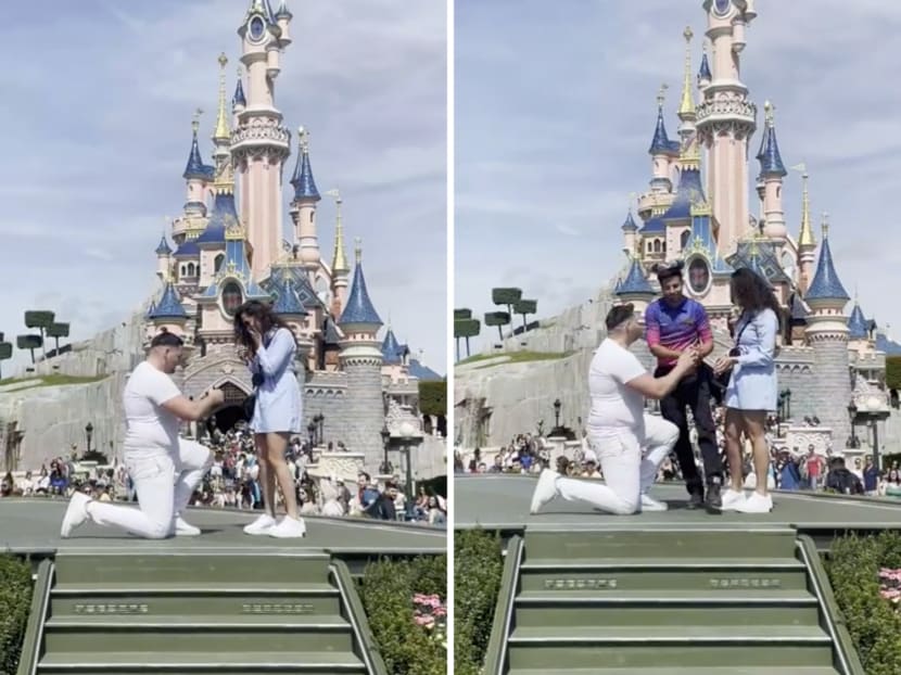 In footages from a video that went viral, a Disneyland employee is seen grabbing a wedding ring from a man during a marriage proposal at Disneyland Paris. In footages from a video that went viral, a Disneyland employee is seen grabbing a wedding ring from a man during a marriage proposal at Disneyland Paris.
