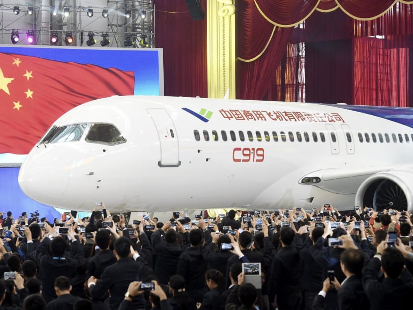 The first C919 passenger jet made by the Commercial Aircraft Corp of China (Comac) is pulled out during a news conference at the company's factory in Shanghai. Reuters file photo