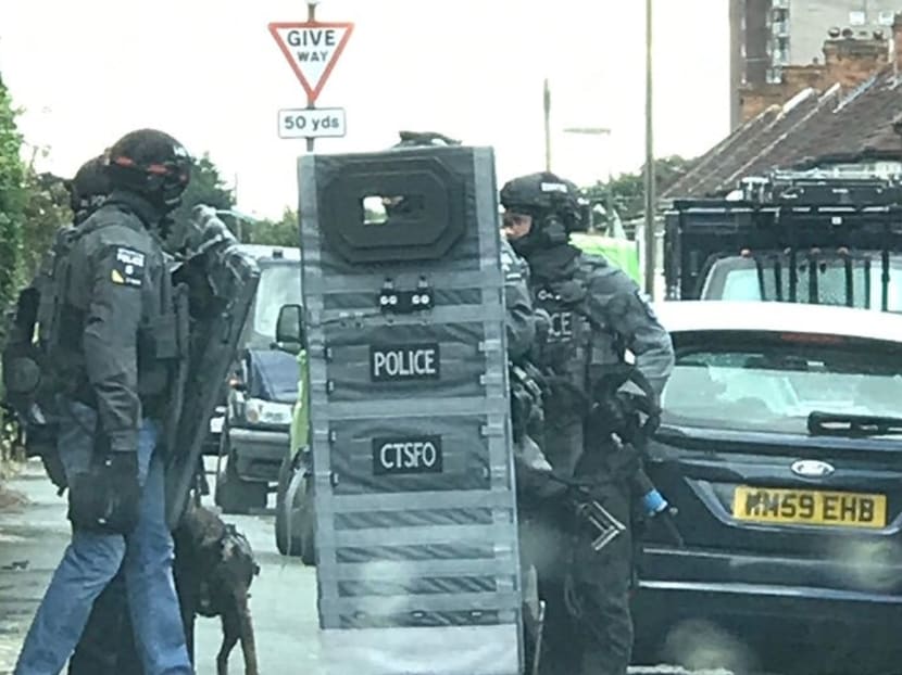 A still photograph shows counter terrorist specialist firearms officers during a raid in Sunbury-on-Thames, Britain September 16, 2017 in this picture obtained from social media. Photo: Reuters