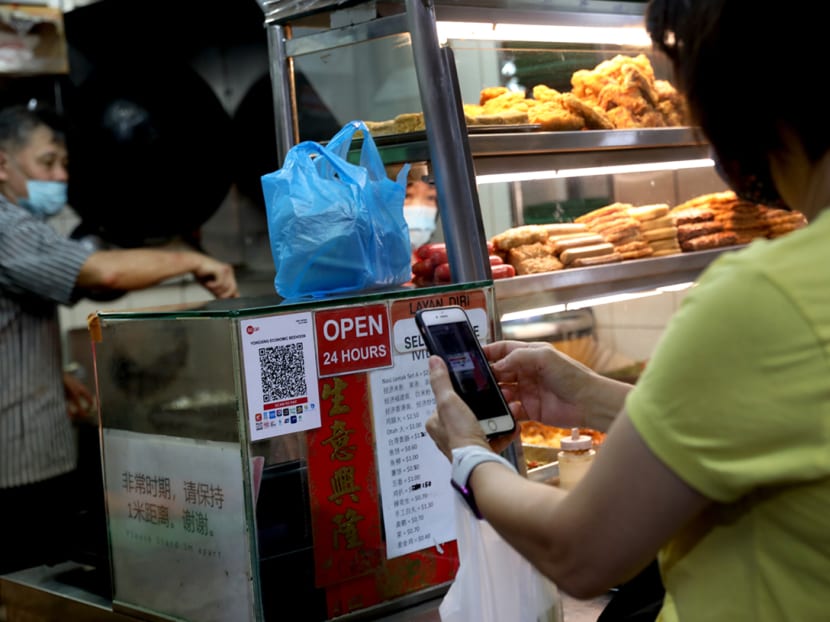 The Hawkers Go Digital programme aims to help 18,000 stallholders adopt digital tools such as e-payments by June next year. The Hawkers Go Digital programme aims to help 18,000 stallholders adopt digital tools such as e-payments by June next year.