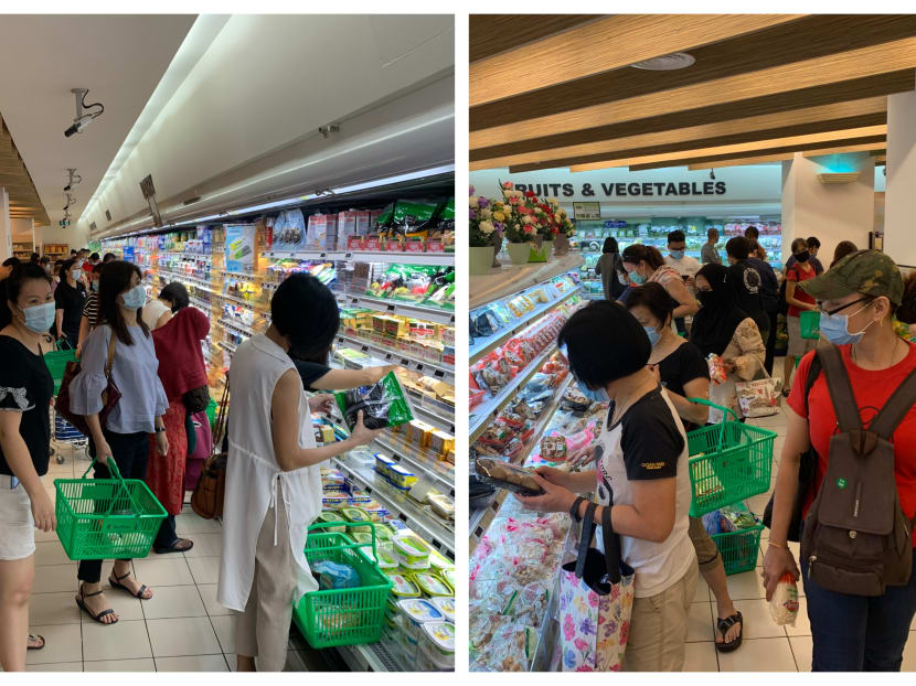 Shoppers browsing in FairPrice supermarket at Northpoint City mall in Yishun at 12.30pm on June 2, 2020.