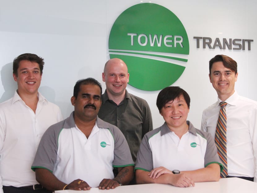 From left: Tower Transit's CFO Andrew Bujtor with bus captain Mr Kalidass, operations and transition manager Stuart Thomas, bus captain Lim Lee Ping and CEO Adam Leishman. Photo: Daryl Kang