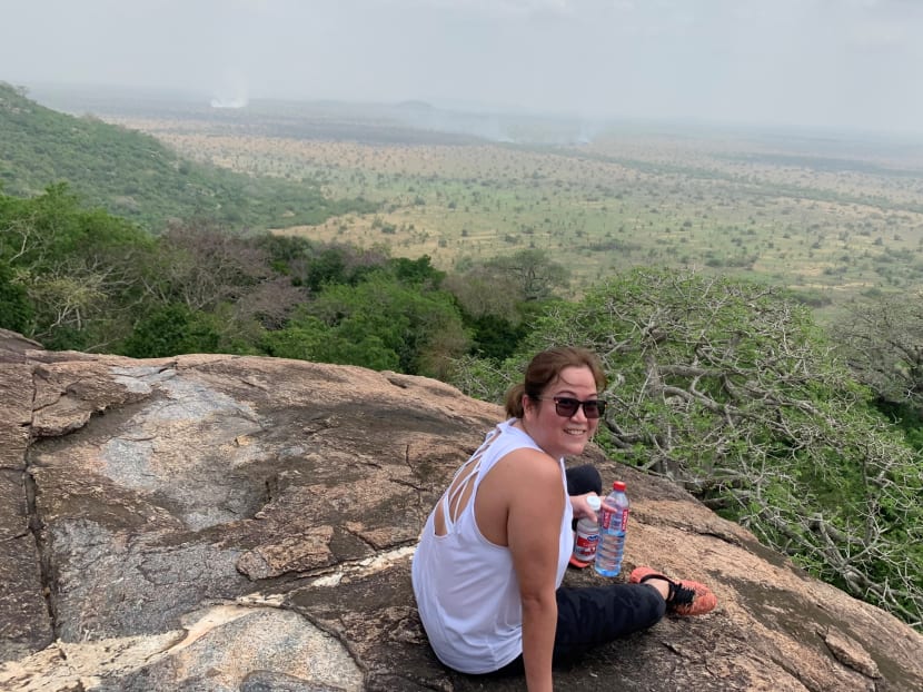 The writer, seen here at the highest point of Shai Hills Resource Reserve in Greater Accra, Ghana, in May 2021, says she discovered the country has good nature reserves and trails to explore not long after moving there.
