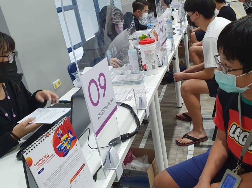 The author's son getting his first dose of the Covid-19 vaccine at Toa Payoh West community club on June 20, 2021.