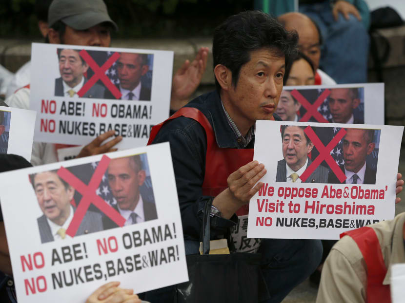 Protesters stage a rally against the visit by US President Barack Obama, near Hiroshima Peace Memorial Museum in Hiroshima, western Japan, Thursday, May 26, 2016. Photo: AP