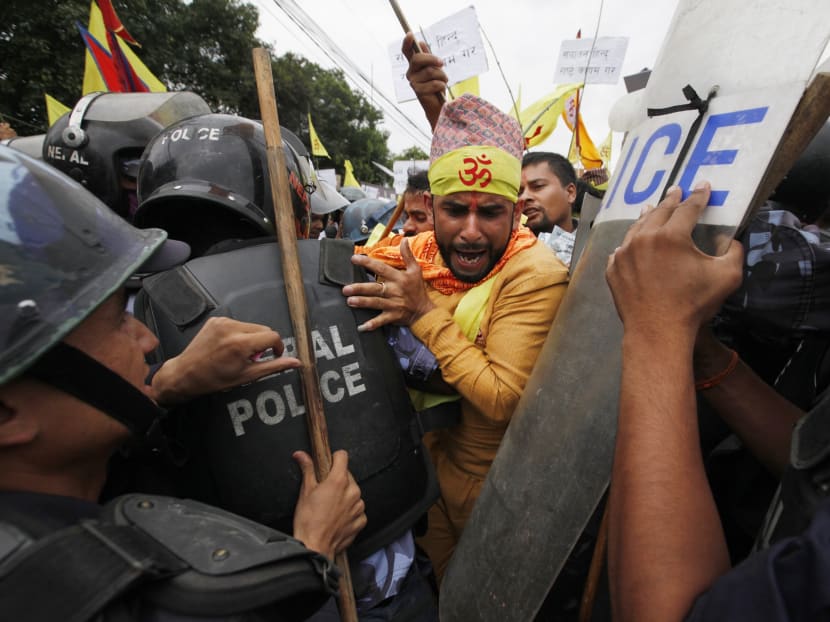 Protesters clash with police in Nepal, demanding Hindu state