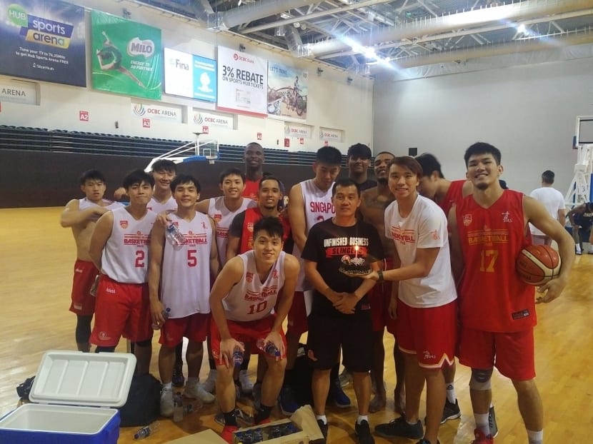 The Singapore Slingers with coach Neo Beng Siang (in black) during a training session at the OCBC Arena. Photo: Singapore Slingers Facebook page