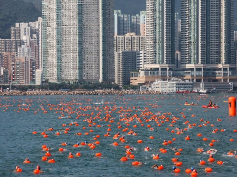 Competitors take part in the annual cross-harbour swim in Hong Kong on Oct 16, 2016. Photo: AFP