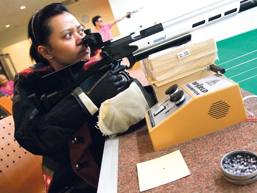 Para shooter Aishah Samad training at the SAFRA Tampines shooting range. 
Photo: Don Wong