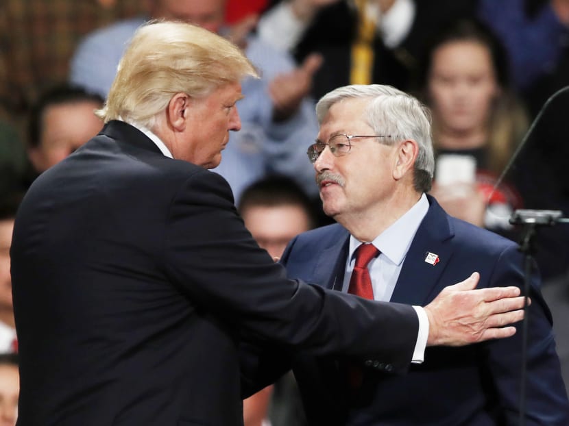 Mr Trump with Iowa Governor Terry Branstad, his nominee for the ambassador to China, on Thursday. Mr Branstad will face a Chinese government on edge over Mr Trump’s criticism of the country. Photo: AP