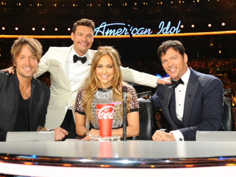 American Idol host Ryan Seacrest poses with judges (from left) Keith Urban, Jennifer Lopez and Harry Connick Jr. Photo: Variety.com/Reuters