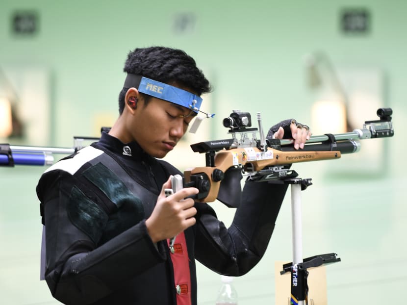Singapore's Mohamad Irwan resorted to focusing on his breathing exercises, and on perfecting the process of his shot to block out the crowd. It worked as he ended up winning silver on his debut. Photo: Sport Singapore/Suki Singh