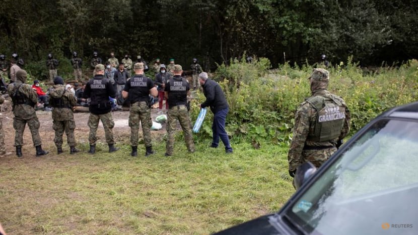Poland illegally pushed migrants back into Belarus, Amnesty International says Poland illegally pushed migrants back into Belarus, Amnesty International says