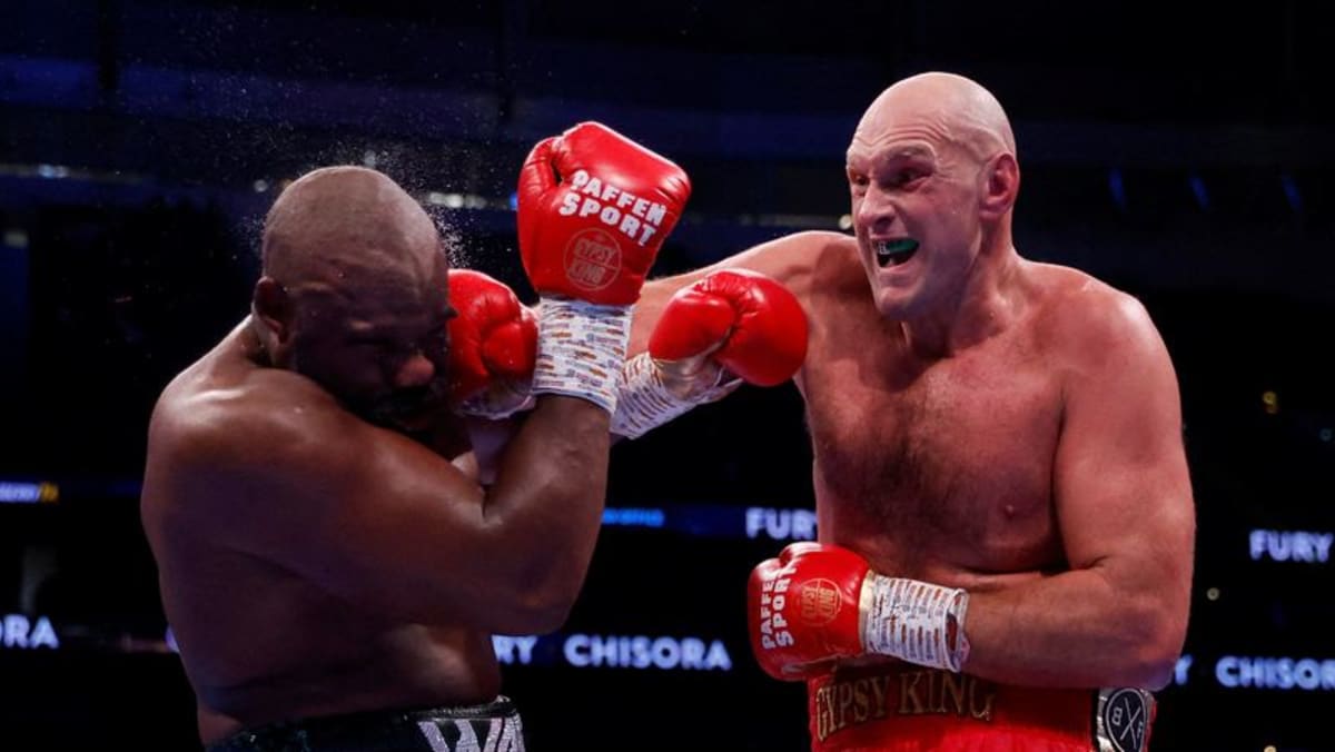 Fury mengejek Usyk setelah mengalahkan Chisora ​​​​untuk mempertahankan gelar WBC
