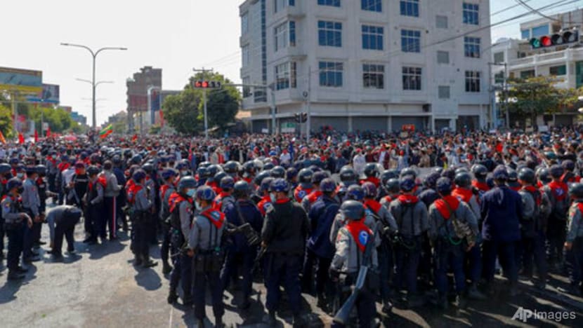 Myanmar state TV says police injured by 'aggressive' protesters Myanmar state TV says police injured by 'aggressive' protesters