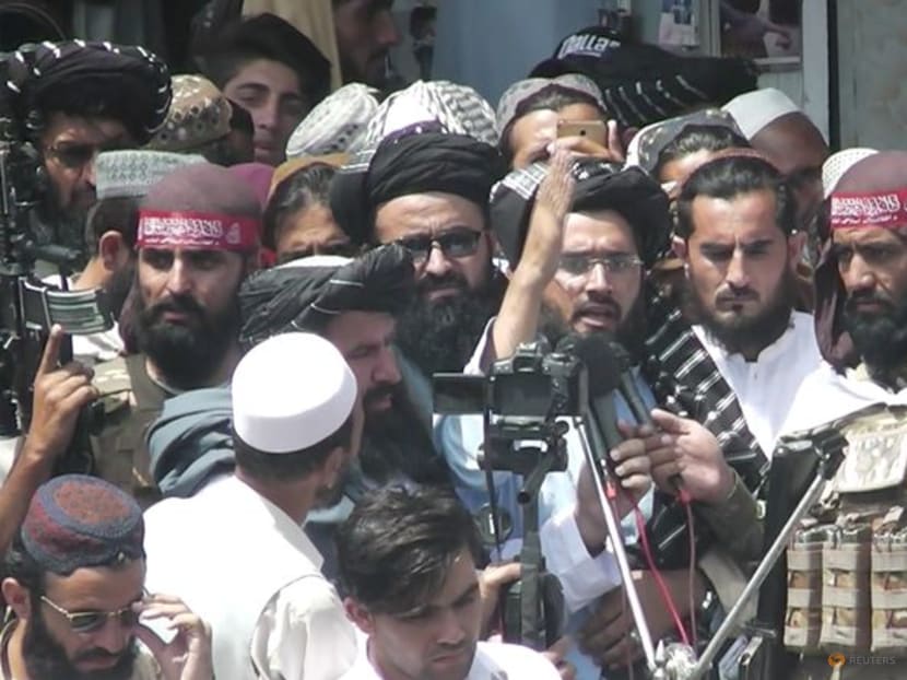 Taliban supporters hold mock US funeral as troops leave Afghanistan