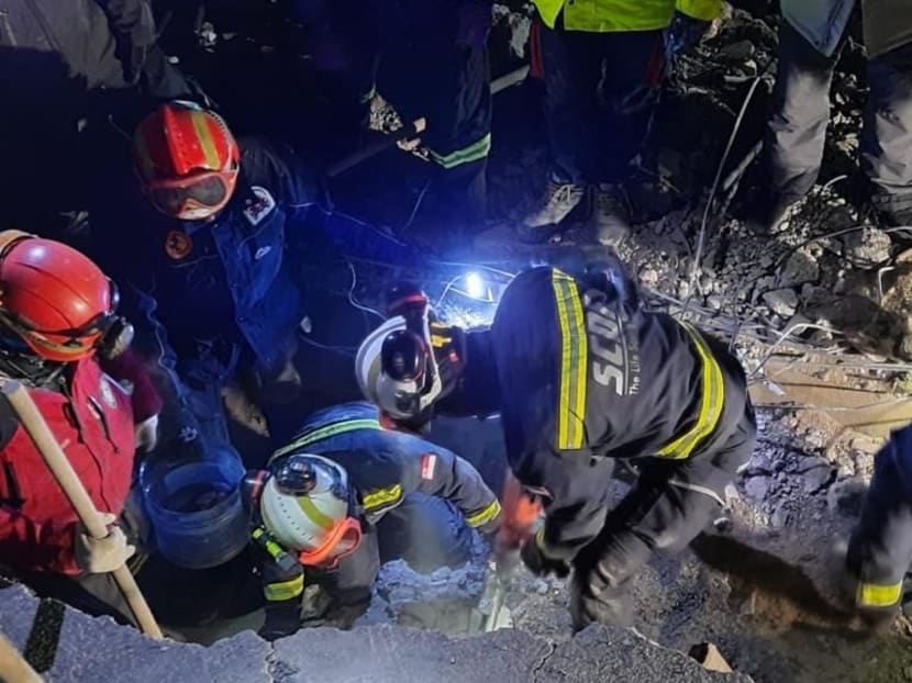 The boy was rescued from a bedroom in a collapsed three-storey building after a three-hour rescue operation. 