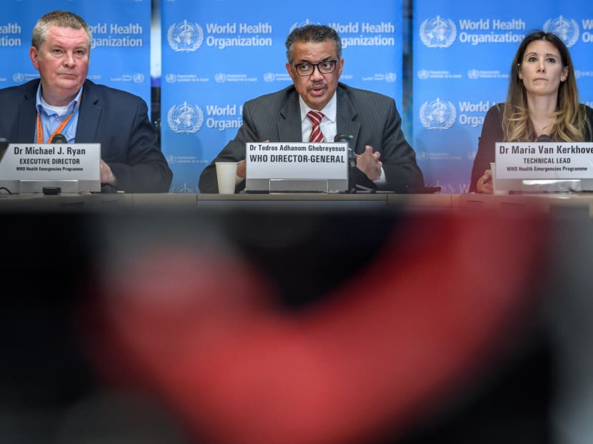 From left: Dr Michael Ryan, executive director of the health emergencies programme at the World Health Organization (WHO), WHO's director-general Tedros Adhanom Ghebreyesus and WHO's technical lead Maria Van Kerkhove at a daily press briefing on Covid-19 on March 11, 2020.