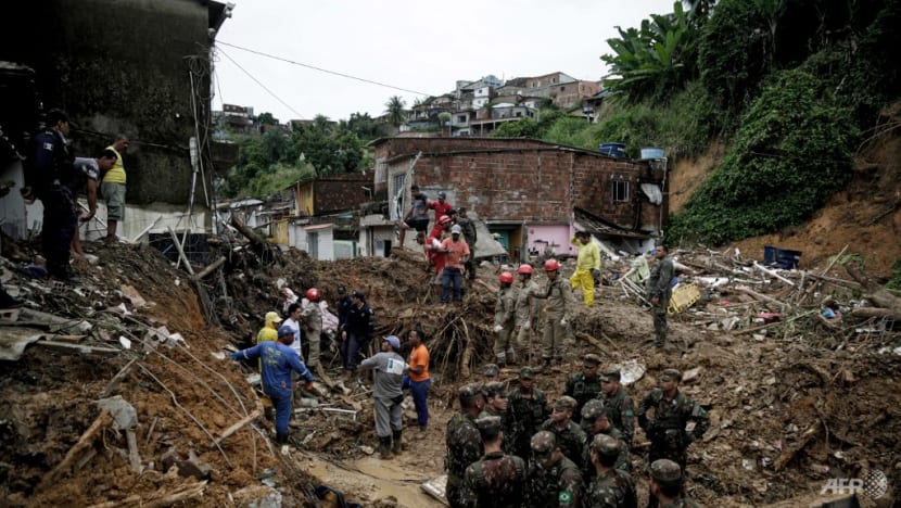 Death toll mounts from Brazil downpours as search continues Death toll mounts from Brazil downpours as search continues