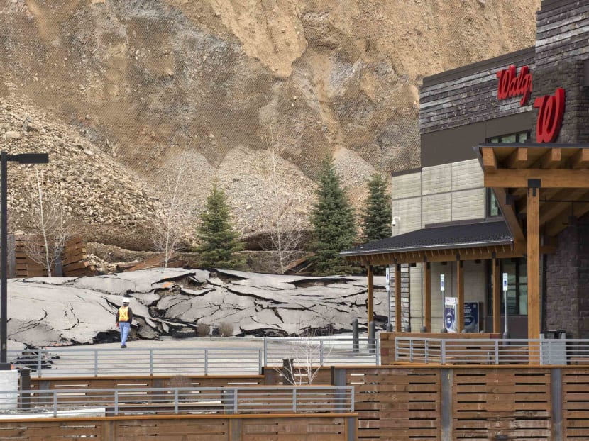 A slow moving landslide buckles the pavement  of a new drugstore parking lot in Jackson Hole, Wyoming April 18, 2014.   Photo: Reuters