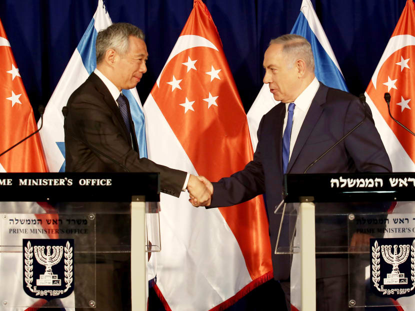 Israeli Prime Minister Benjamin Netanyahu and his Singaporean counterpart Lee Hsien Loong during a welcome ceremony on Tuesday at the Prime Minister’s Office in Jerusalem. Both leaders reaffirmed the close and long-standing relations between both countries, said a statement from the Singapore PMO. Photo: AFP