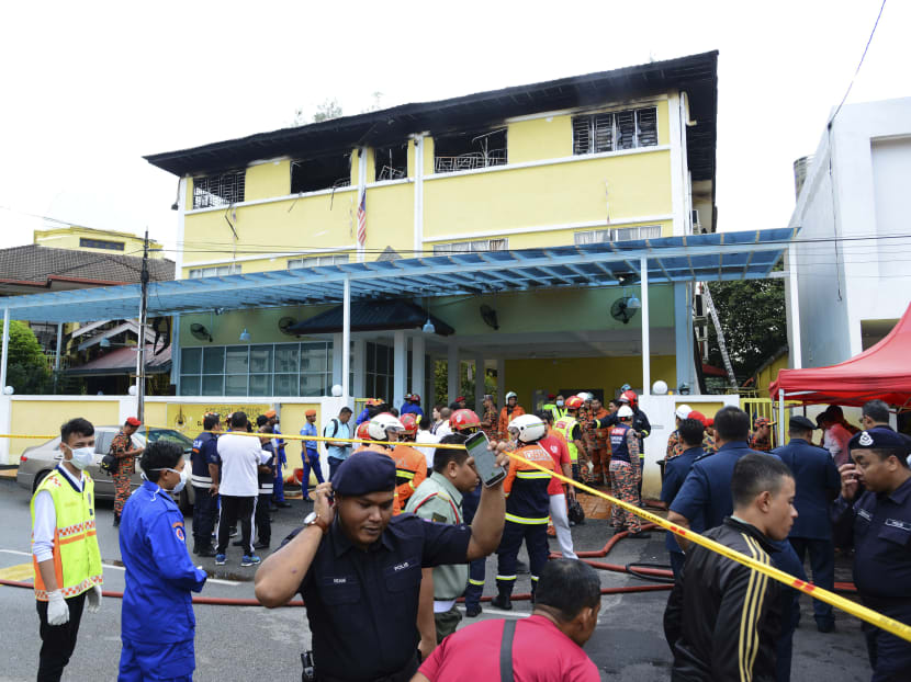 Malaysia fire blocks lone exit of Islamic dormitory; 23 dead