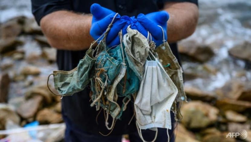 Commentary: That new problem of disposable masks ending up as trash on pavements and beaches Commentary: That new problem of disposable masks ending up as trash on pavements and beaches
