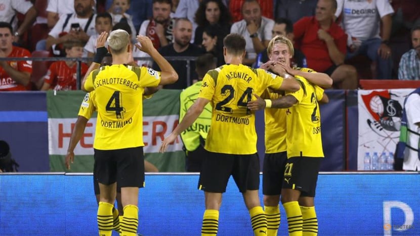 Dortmund ride early momentum to big win at Sevilla, Lopetegui sacked