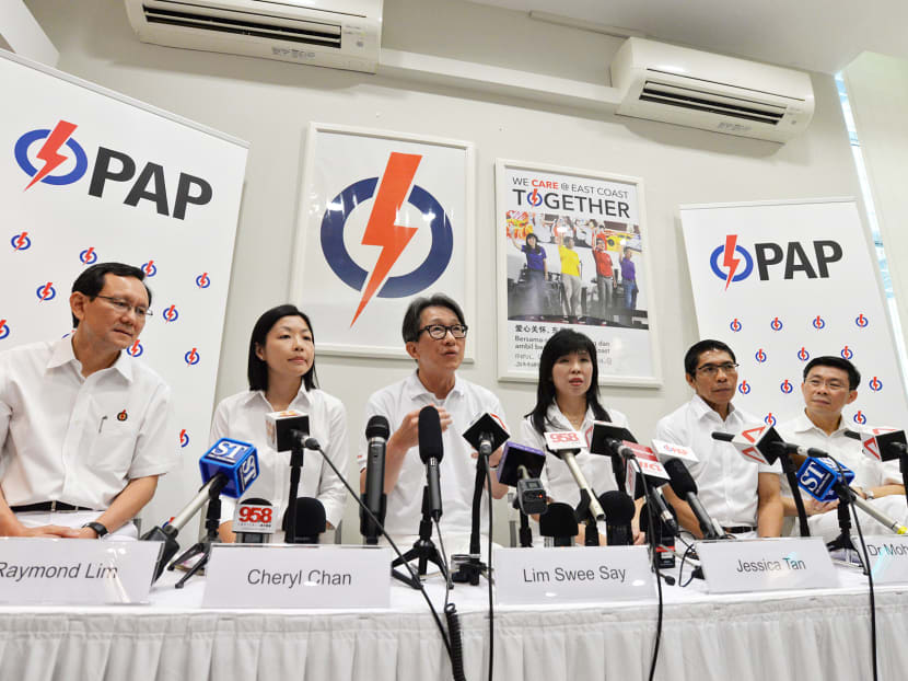 From left: Mr Raymond Lim, Ms Cheryl Chan, PAP’s new face and candidate for Fengshan SMC, Mr Lim Swee Say, Ms Jessica Tan, Dr Maliki Osman and Mr Lee Yi Shyan addressing the media yesterday. Photo: Robin Choo