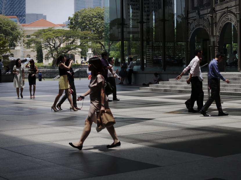 Crowds in the Central Business District in Singapore. Singapore's government has introduced various measures such as SkillsFuture and Workforce Skills Qualifications to ensure that Singaporeans remain employable in the face of automation. TODAY file photo