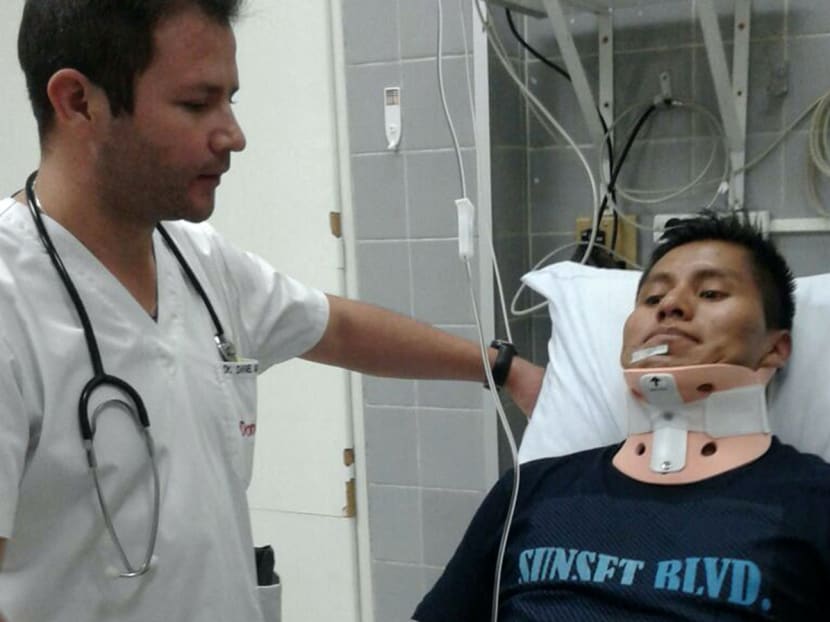 Mr Erwin Tumiri recovers in a clinic in Cochabamba, Bolivia on Dec 3, 2016 after being one of the six survivors of the airplane that crashed in Colombia. He also survived a bus that plunged some 150m off a cliff near Cochabamba on March 2, 2021, killing 21 people and injuring 30.