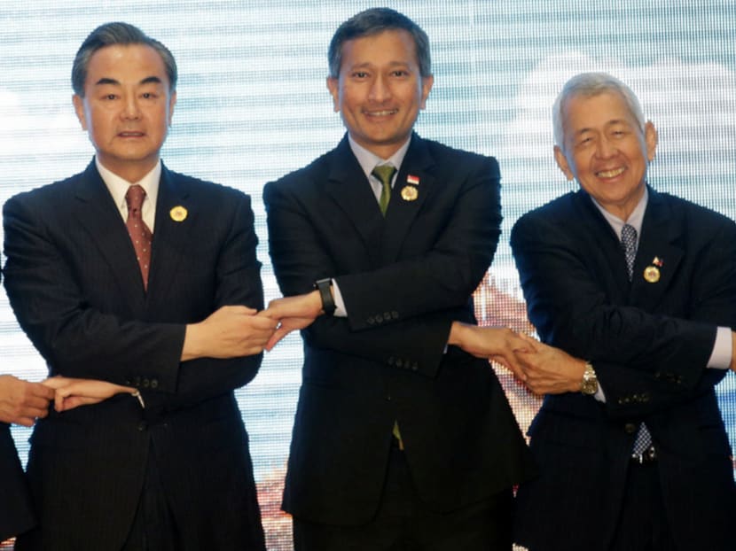 (From left) Chinese Foreign Minister Wang Yi, Foreign Minister Vivian Balakrishnan and Philippine Foreign Minister Perfecto Yasay attending the Asean foreign ministers’ meeting, where The Hague’s South China Sea ruling was a contentious issue. PHOTO: AP