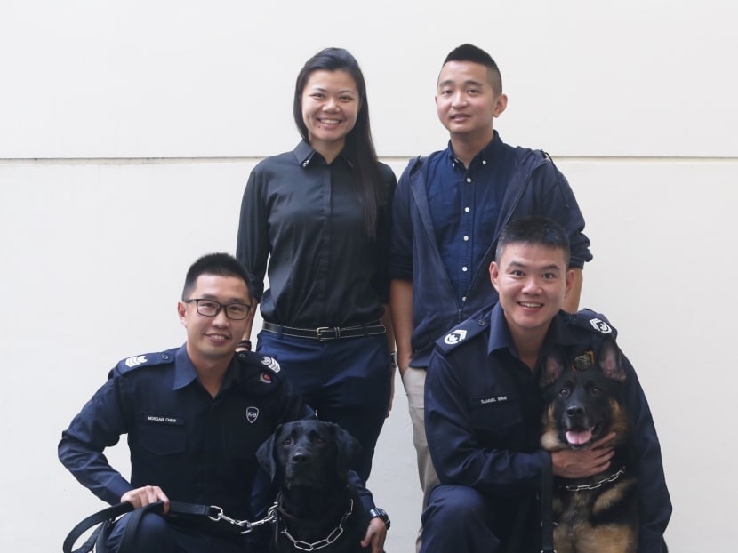 (Standing, from left) Investigating officers Insp Jane Chen and ASP Melvin Seah, along with officers from the K-9 Unit Senior Staff Sergeant Morgan Chew and Station Inspector Samuel Shue were all involved in the operation. PHOTO: Koh Mui Fong/TODAY