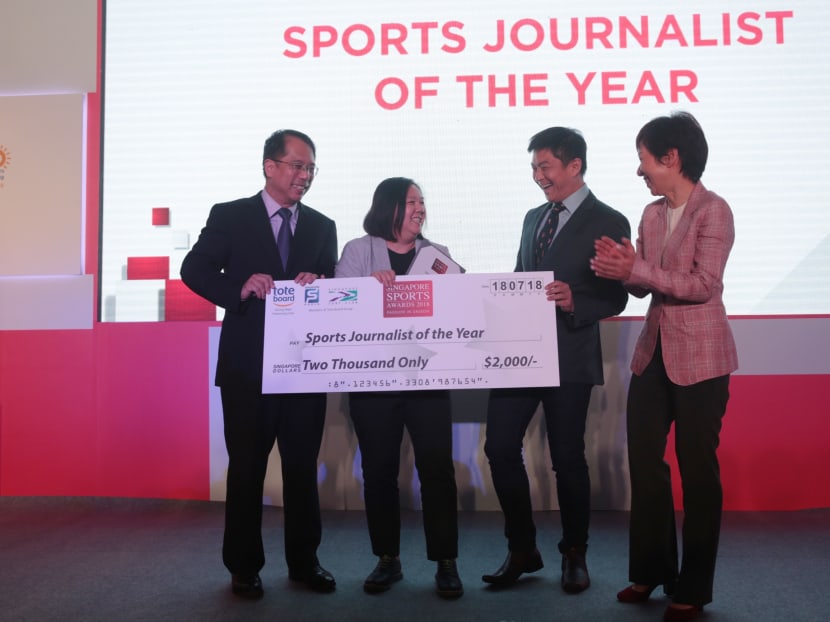 TODAY's Low Lin Fhoong receives the Sports Journalist of The Year award at the 2018 Singapore Sports Awards award ceremony on Wednesday, July 18, 2018.
