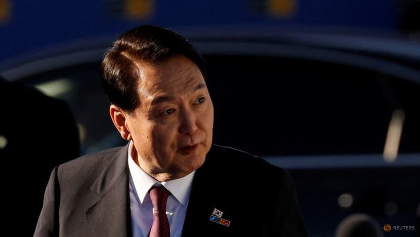 South Korea's president suspends informal media briefings, citing COVID-19