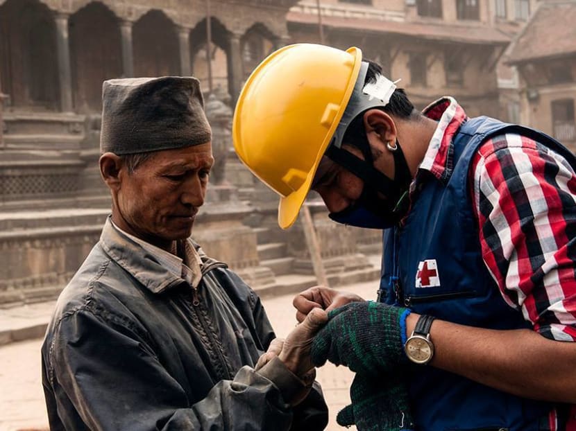 A member of the Nepal Red Cross providing first aid. Photo: Facebook/International Red Cross and Red Crescent Movement