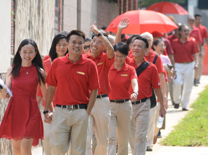 Dr Chee Soon Juan (fourth from left), SDP sec-gen, arriving with fellow candidates and supporters at the Assumption Pathway School nomination centre, on Sept 1, 2015. Photo: Robin Choo