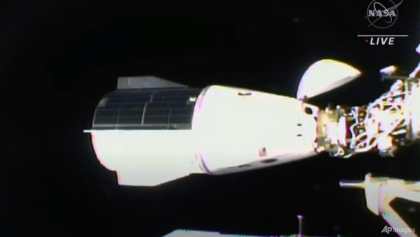 SpaceX capsule carrying 4 astronauts docks with International Space Station SpaceX capsule carrying 4 astronauts docks with International Space Station