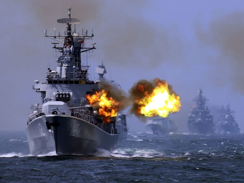 In this May 24, 2014 photo, China's Harbin (112) guided missile destroyer takes part in a week-long China-Russia Joint Sea-2014 navy exercise at the East China Sea off Shanghai, China. Photo: AP/China Out