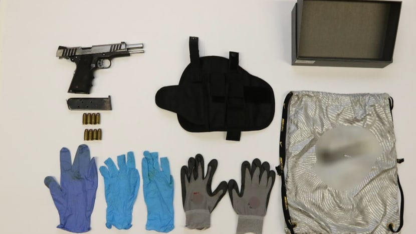 Loaded pistol found in Jurong West flat; 2 arrested Loaded pistol found in Jurong West flat; 2 arrested