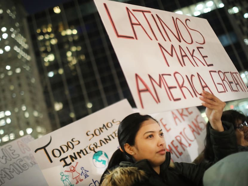 People attending a rally organised by the New York Immigration Coalition. Trump has signed off on memos that say any undocumented immigrant may now be deported. Photo: AFP