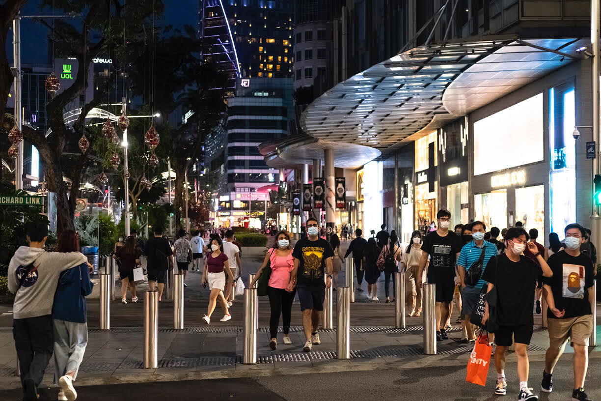 Crowds of people are seen along Orchard Road on Oct 10, 2021.