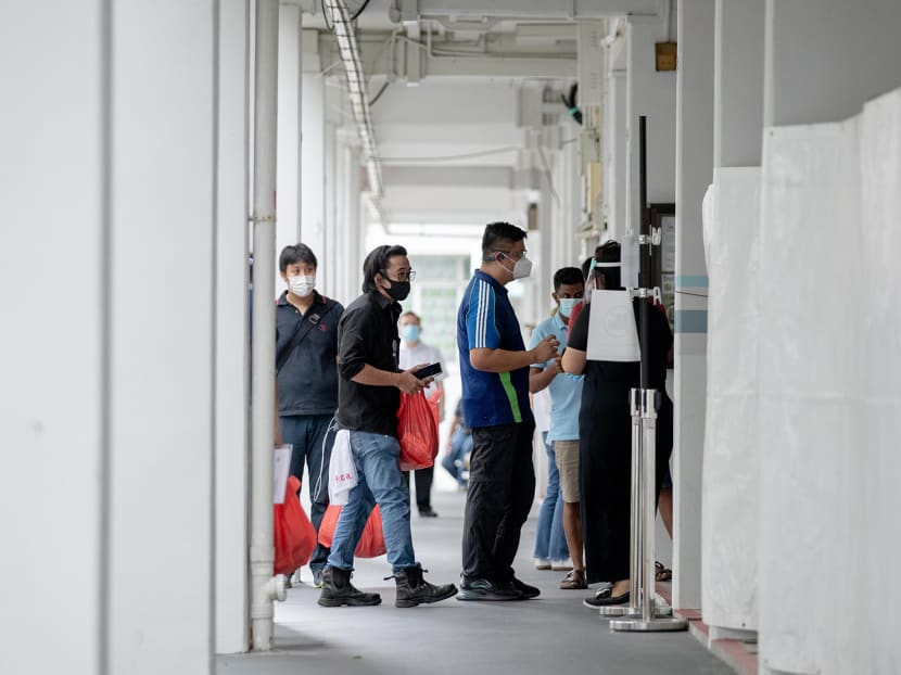 Residents living at Block 506, Hougang Avenue 8, queuing for a Covid-19 swab test at the block’s void deck on May 21, 2021. Residents living at Block 506, Hougang Avenue 8, queuing for a Covid-19 swab test at the block’s void deck on May 21, 2021.