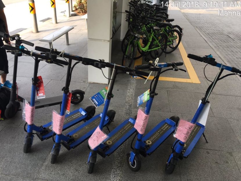 Telepod e-scooters impounded at a bus stop along Bayfront Avenue. The local startup is one of the firms that have been vying for the LTA licence.