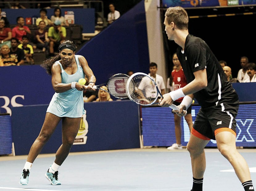 Serena Williams and Tomas Berdych won their mixed doubles tie 6-4 as the Singapore Slammers beat the UAE Royals for their second win in the series. Photo: Wee Teck Hian