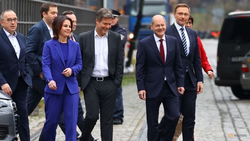Three German parties reach coalition deal to end the Merkel era Three German parties reach coalition deal to end the Merkel era