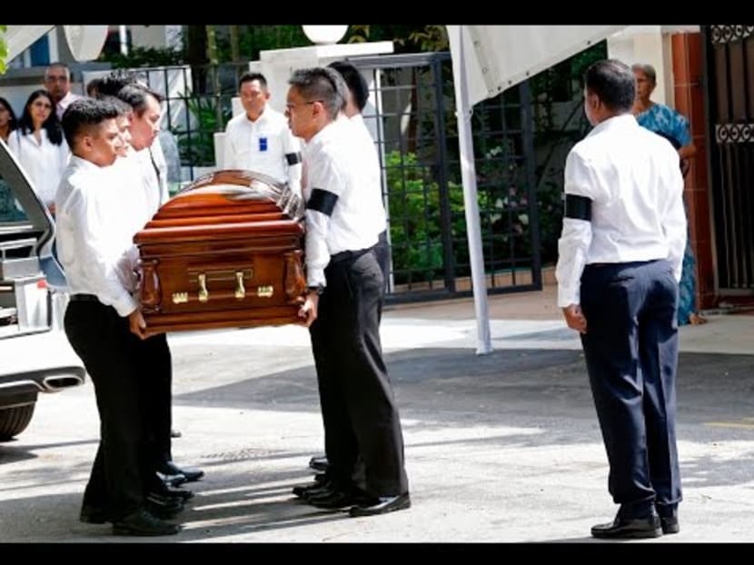 Body of S R Nathan arrives at family home for private wake
