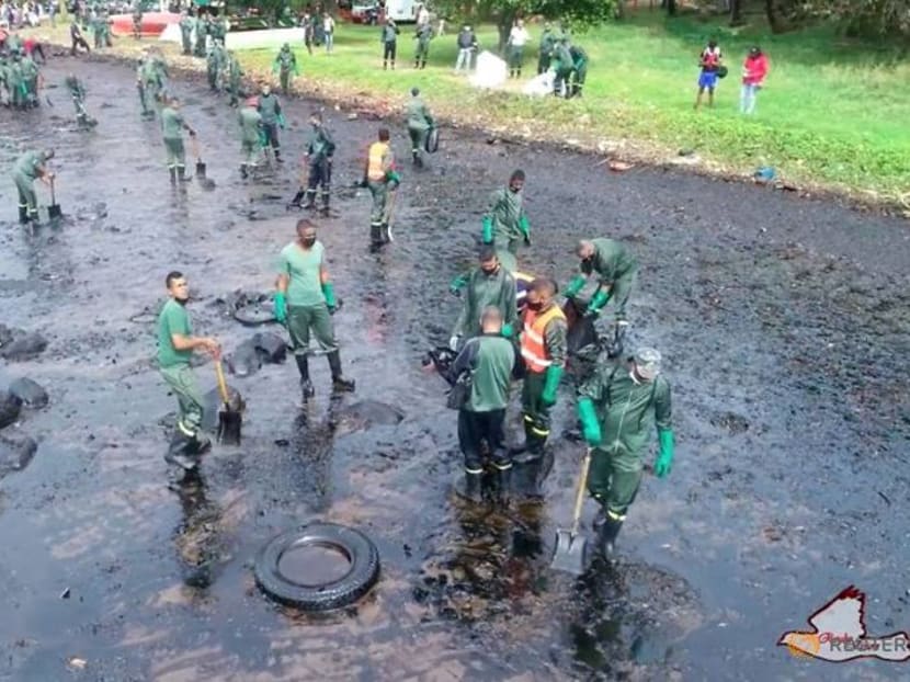 Anxious Mauritians use hair to stem Japanese ship's oil spill Anxious Mauritians use hair to stem Japanese ship's oil spill