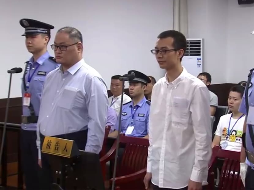 This video grab from footage on the website of Yueyang Intermediate People's Court taken on Sept 11, 2017 shows Taiwanese activist Lee Ming-cheh (2nd L) standing with Chinese co-defendant Peng Yuhua (2nd R) in court in Yueyang in China's central Hunan province. Photo: Yueyang Intermediate People's Court via AFP