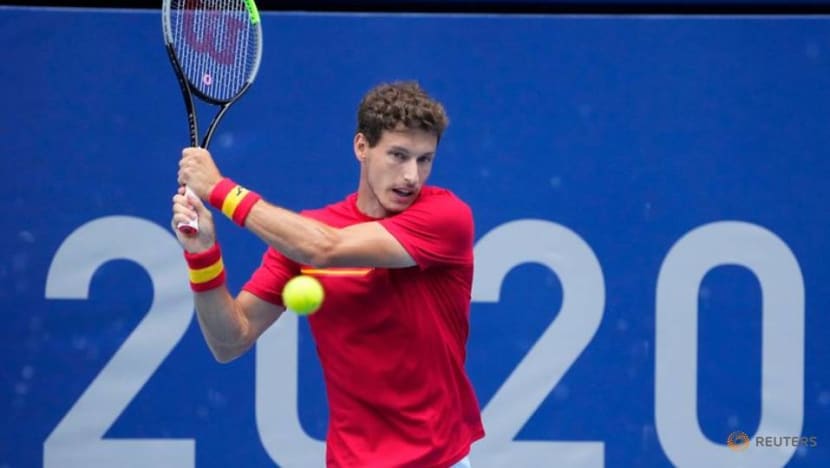 Olympics-Tennis-Spain's Carreno Busta beats listless Djokovic for bronze